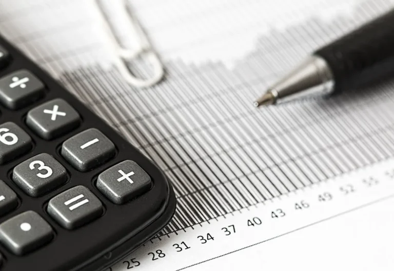 Calculator and Pen on Table. Image used for illustration purposes. PHOTO/Pexels
