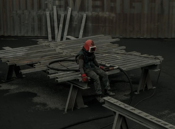 Tired Worker sitting on Steel Beams. Image used for representation purposes only in this article. PHOTO/Pexels