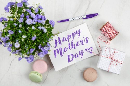 Mother's Day card and Purple-petaled Glower Besode Pen. Image Used for representation purposes only. PHOTO/Pexels