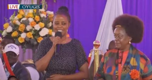 Muthoni Murabu speaking while standing alongside Millie Odhiambo during Charles Were's funeral. PHOTO/ https://www.youtube.com/watch?v=Jleb3J8hEEk