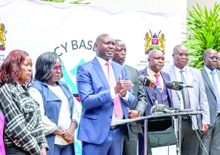 Basic Education Principal Secretary Prof Julius Kibet Bitok (centre) speaking at a recent press briefing in Nairobi. PHOTO/Print