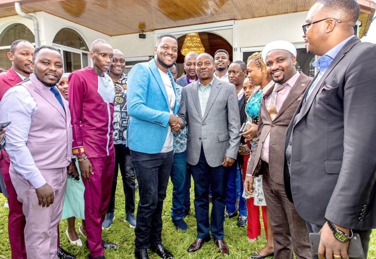 Deputy President Kithure Kindiki engages with musicians and producers from Mt Kenya at his Karen residence in Nairobi. PHOTO/DPCS  