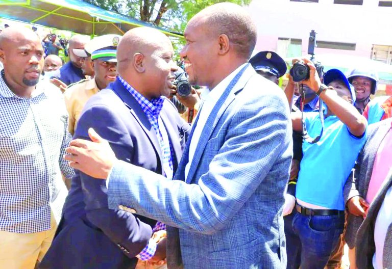Former Interior Cabinet Secretary Fred Matiang’í acknowledges greetings from his supporters in Kisii town, including Kisii Governor Simba Arati (right), on Friday. PHOTO/Robert Ochoro
