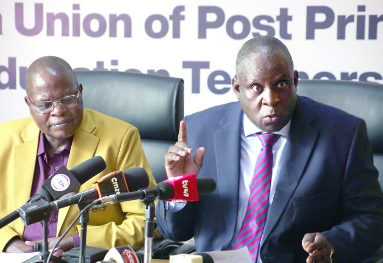 Kuppet Secretary General Akello Misori (left) with the union’s National Chairman Omboko Milemba during a press briefing in Nairobi yesterday. PHOTO/Bernard malonza