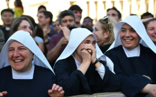 Crowd jumps for joy and prays in celebration of new pope