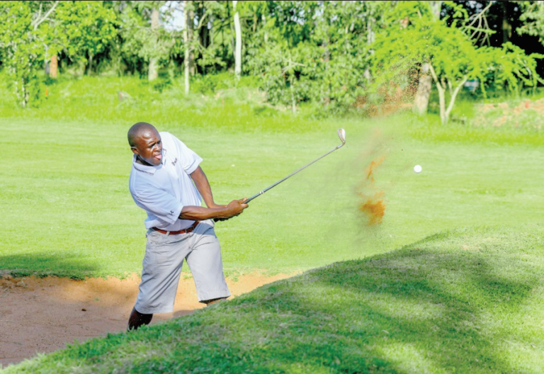 Brian Otieno of Kiambu Golf Club plays a shot out of the bunker during the NCBA Golf Series at Thika Sports Club. PHOTO/SPORT PICHA