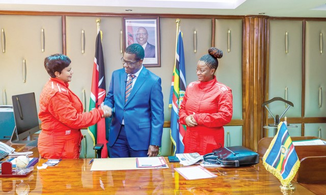 Left to right: Pauline Sheghu, CS Opiyo Wandayi and Linet Ayuko. PHOTO/SPORT PICHA
