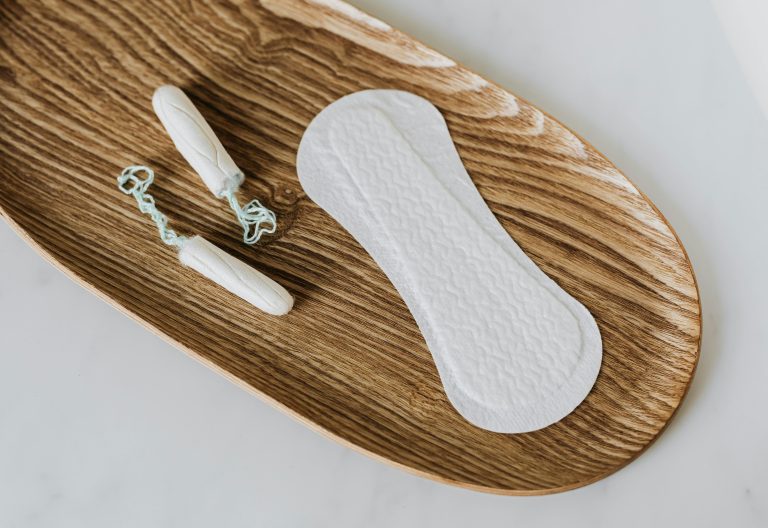 Menstrual products on wooden stand. Image used for representational purposes only. PHOTO/Pexels