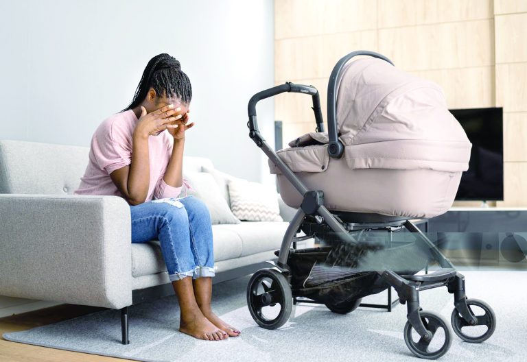 Depressed unhappy woman with a new-born. Image used for representational purposes only. PHOTO/Pexels