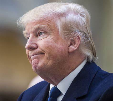 Donald Trump speaks to reporters ahead of his speech at the Conservative Political Action Conference March 4 PHOTO/anna maker/x