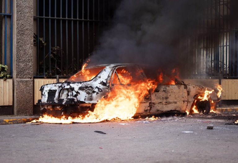 A car burns in Nairobi’s CBD after being set ablaze during protests over the death of blogger Albert Ojwang on Thursday, June 12, 2025. PHOTO/@jamrockjammie/X
