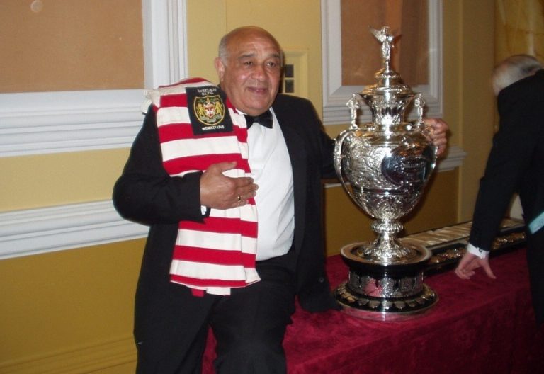 Sir Billy Boston holding a trophy. PHOTO/@WalesRugbyL/X