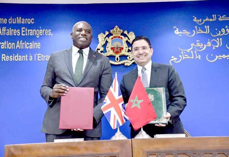 UK Secretary of State for Foreign and Commonwealth Affairs David Lammy and Minister of Foreign Affairs, African Cooperation and Moroccan Expatriates, Nasser Bourita pose with the document recognising the Autonomy Plan over Moroccan Sahara. PHOTO/Print