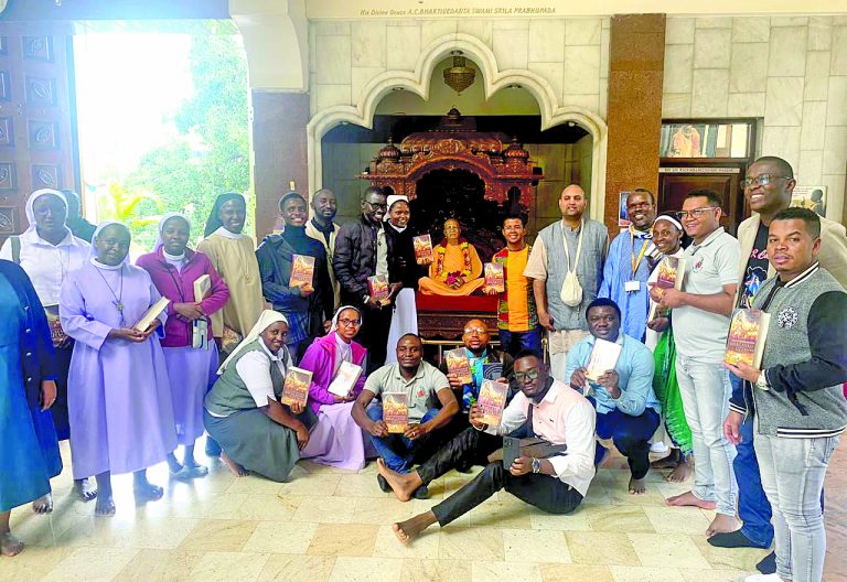 The Hare Krishna Training Centre youth pose for a photo with Catholic faithful that paid them a courtesy call. PHOTO/Francis Githinji 