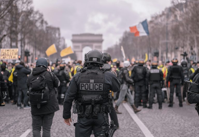 Protesters face off with police officers during a demonstration. Image used for illustration purposes only. PHOTO/Pexels