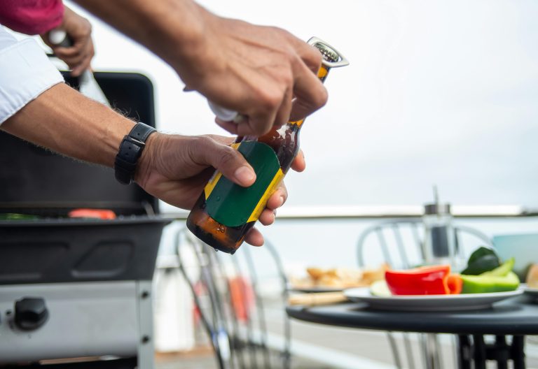 A person\'s hands opening a beverage bottle. Image used for representational purposes only. PHOTO/Pexels