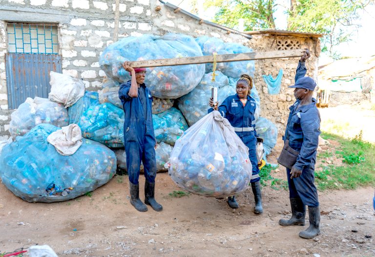 Members of Mikoroshoni, a youth group in Mombasa, weigh waste materials. INSET: Jil Industries founder Arvind Bhudia. Jil industries manufactures water tanks made from 100 per cent recycled plastic. PHOTO/PCEA