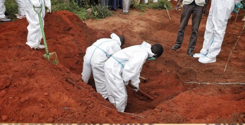 Workers dig up a grave in Shakahola forest in Malindi in 2023. PHOTO/@InteriorKE/X