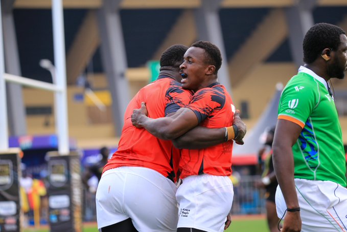 Griffin Chao celebrates with a teammate after scoring Kenya’s opening try against Uganda in the Rugby Africa Cup quarterfinal. PHOTO/https://www.facebook.com/share/p/1C7RWCexGH/