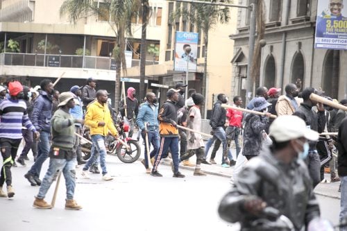 Armed goons patrol part of Moi Avenue in Nairobi during protests on June 17, 2025. PHOTO/Bernard Malonza