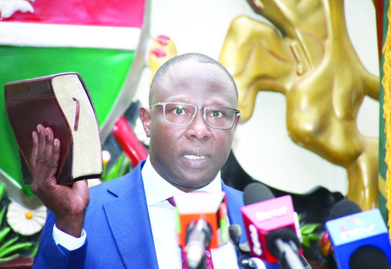Swearing in of Erastus Edung Ethekon as the Chairperson of Independent Electoral Boundaries Commission. PHOTO/Print