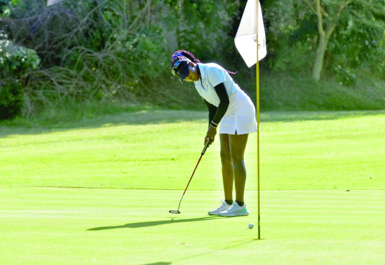 Naomi Wafula putts for a birdie at the 13th green of Ruiru Sports Club during the Sunshine Development tour last month. PHOTO/Alex Njue