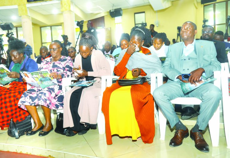 Eucabeth Adhiambo (2nd right), mother to the late Albert Ojwang’ wipes tears during his requiem service at the Ridgeways Baptist Church. She is flanked by Nevnina Onyango (left), Albert Ojwang’s widow and Meshack Ojwang’, his father (right). PHOTO/Philip Kamakya