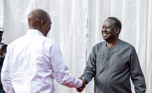 William Ruto and Raila Odinga shake hands during a Cabinet Retreat in Karen on June 20. PHOTO/https://www.facebook.com/RailaOdingaKE