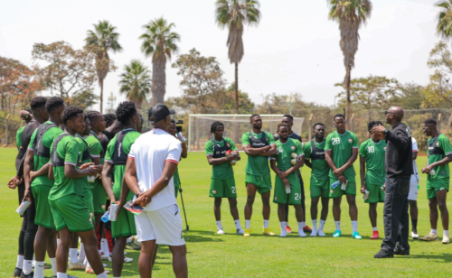 Musician Bien Aime spends time with Harambee Stars players on July 28, 2025. PHOTO/@Harambee_Stars/X