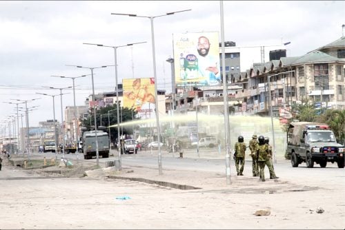 Police officers use a water Canon to spray protesters at Kitengela during the Saba Saba protests. PHOTO/Christine Musa