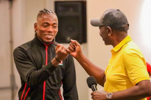 William Ruto, while making a bet with Harambee Stars Captain Aboud Omar as he pledged millions in reward for Harambee Stars ahead of the CHAN 2024 opener on August 2, 2025. PHOTO/@Football_Kenya/X