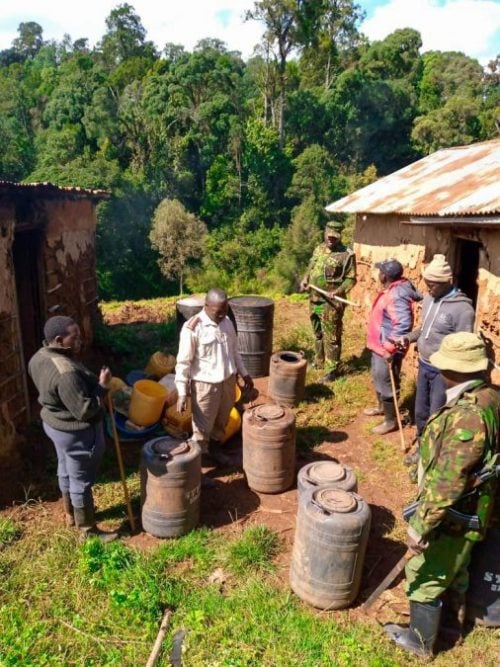 Police officers inspect the site where illegal brews were being produced.PHOTO/@NPSOfficial_KE
