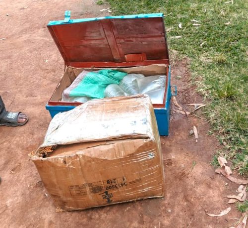 50 sachets of chang'aa packed in a metal box and a carton recovered by police during their inspection of the abandoned motorcycle. PHOTO/@NPSOfficial_KE