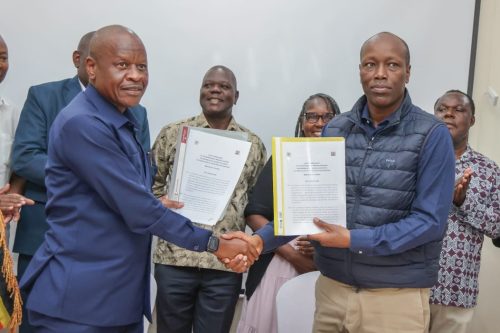 Lee Kinyanjui after signing an agreement with the Ugandan trade minister. PHOTO//@GovLeeKinyanjui/X