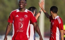 Olunga celebrates a goal and a win as Al Arabi