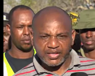 Government pathologist Richard Njoroge during the exhumation exercise. PHOTO/Screengrab by People Daily Digital