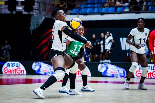 Malkia Striker's captain Meldina Sande receives the ball during their match against Poland at the Municipal Arena during the Volleyball Women's World Championship in Thailand. Kenya lost 3-1. PHOTO/FIVB
