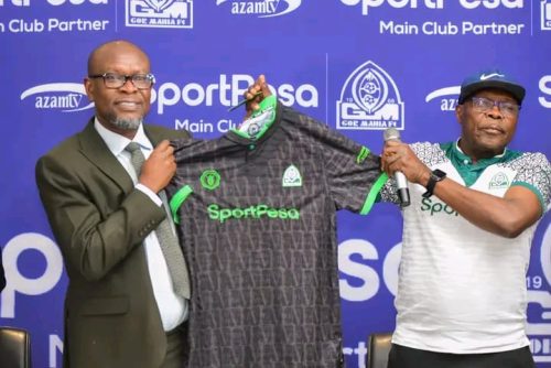 Gor Mahia Chairman Ambrose Rachier (R) unveils Charles Akonnor as new Gor Mahia head coach. PHOTO/https://www.facebook.com/100063697743955/posts/pfbid0FT2nVkVmJCgP6QiZcoP41fXhtwQVZJCBfYC4WdMfqt89u5hQAoU9zAFcHaVMg7Sxl/?app=fbl
