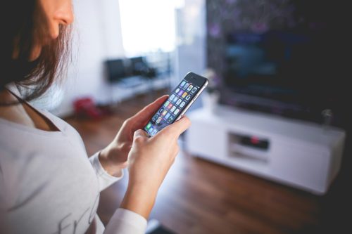 A woman using a phone