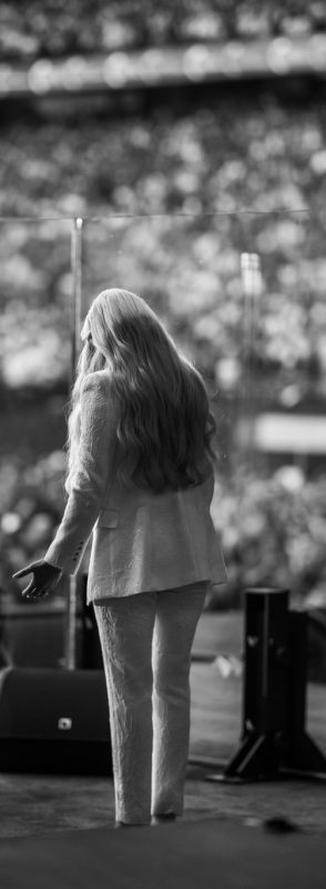 Charlie Kirk's widow Erika Kirk photographed from behind breaking down during memorial service in Arizona. PHOTO/https://www.facebook.com/WhiteHouse