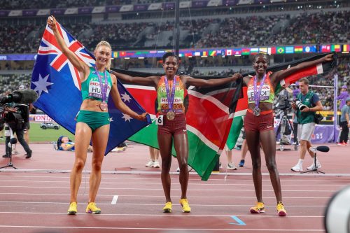Australia’s Jess Hull with Kenya’s Faith Kipyegon and Dorcus Ewoi celebrate after the women’s 1500m final at the World Athletics Championships in Tokyo. PHOTO/@athletics_kenya/X