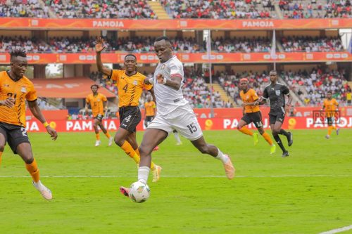 Ryan Ogam fires past Zambia defenders in Kenya’s CHAN clash on August 17, 2025. PHOTO/@orengo_james/X