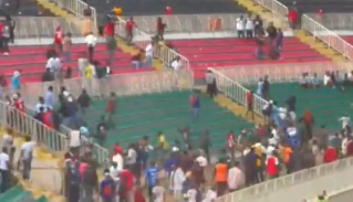 Security personnel disperse fans after clashes. PHOTO/Screengrab by People Daily Digital