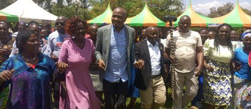 Moses Kuria is welcomed by Duncan Mbui and his supporters in Ishiara. PHOTO/Brian Malila