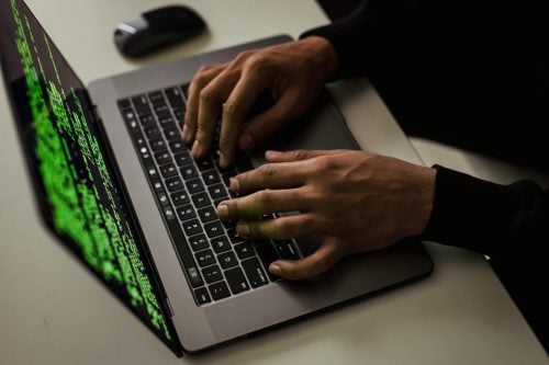 A person using a laptop. Photo used for illustration purposes. PHOTO/Pexels