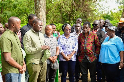 Johnson Sakaja, James Orengo, and Raila’s family members during the visit to Raila’s grave in Bondo. PHOTO/https://www.facebook.com/JamesOrengo