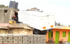 One feared dead as lorry ferrying alcohol rams into hardware