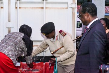 Education CS Julius  Migos Ogmaba opened the Kenya National Examinations Council (KNEC) container at the Kitui Central DCC offices in Kitui County, on Friday, October 31, 2025. PHOTO/@HonJuliusMigos