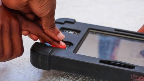 A finger on a biometric machine during an IEBC voter registration process. PHOTO/https://web.facebook.com/IEBCKenya
