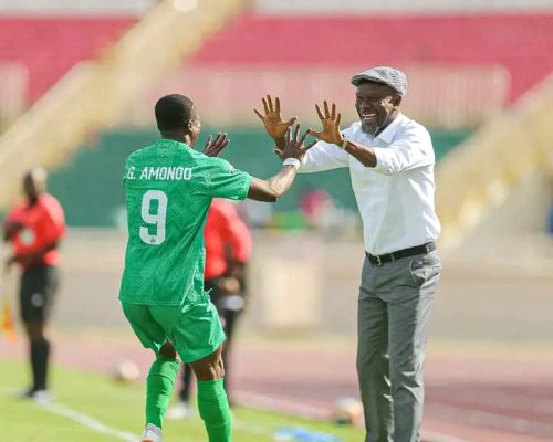 Ghanaian forward George Amonoo, celebrates his goal against APS Bomet with head coach Charles Akonnor at Nyayo Stadium on Tuesday, November 25, 2025. PHOTO/Gor Mahia FC
